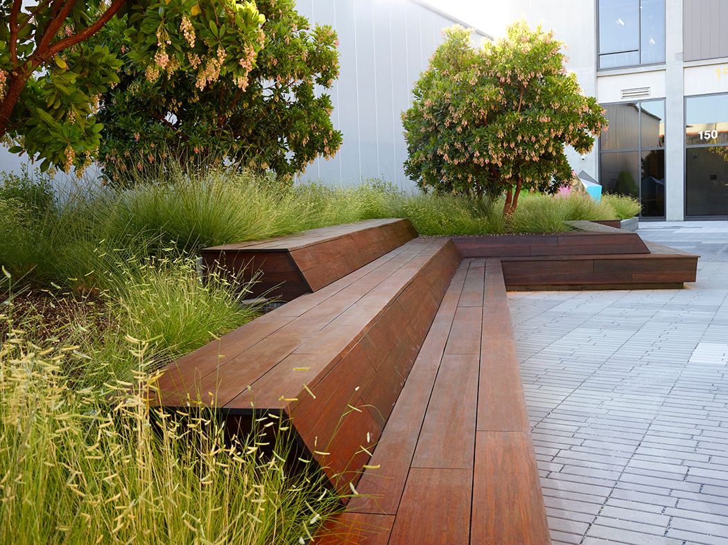 Above the double-height, 18-feet tall retail/maker spaces are three floors of offices.