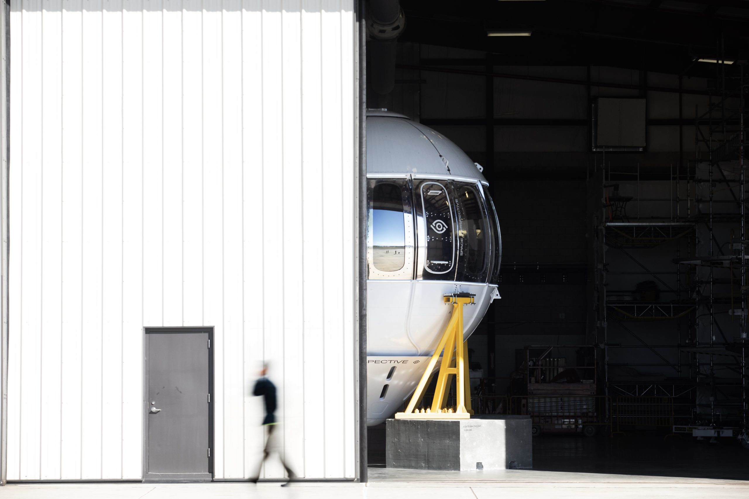 Space Perspective_Capsule behind Hangar Door_Landscape