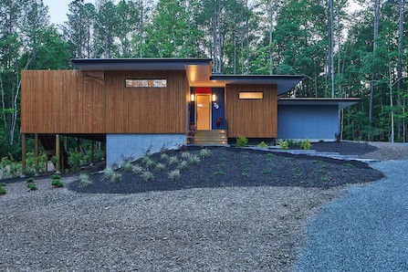 “There’s a veil of cypress to shield them,” she says. “On the south side, it breaks free with a big porch – and there are little bursts of freedom.”