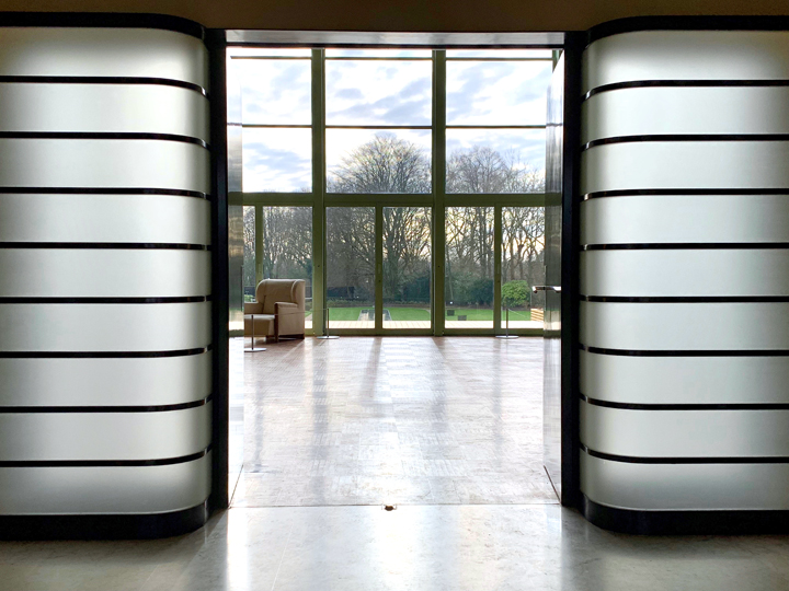 Reaching the entrance of the villa on a quiet side street off the main road, I approached a non-descript service building of ochre colored brick, feeling disappointed.