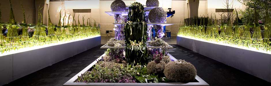 In the case of the Philadelphia International Flower Show, where they’ve just racked up five major awards – including Best in Show – they stacked six cargo containers on top of each other and filled them with flowers, lights and mirrors.