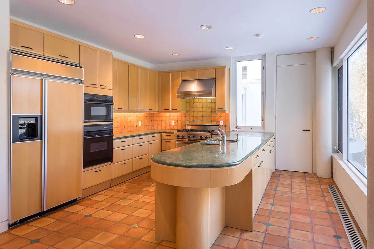 A kitchen with a large island
